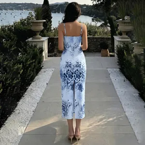 Detailed view showing the elegant back design and blue abstract print of the slip dress.