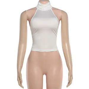 Detailed view of women white sleeveless backless crop top showing neckline and cut.