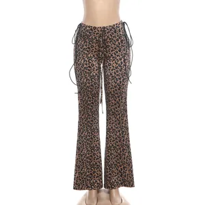 Sexy low waist leopard print flare pants for women, trendy slim fit lace up trousers.
