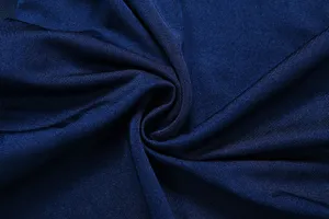 Tessuto blu scuro consistenza dettaglio primo piano che mostra superficie elastica liscia