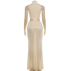 Beige sleeveless crop top and long skirt two-piece set, elegant summer slim fit outfit.