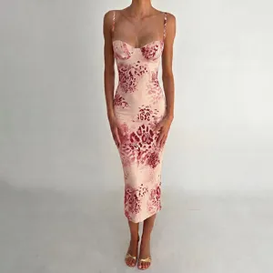 Detail view of pink leopard print bodycon midi dress featuring sweetheart bustier neckline.