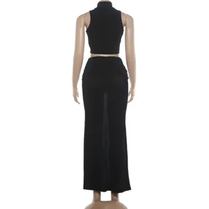 Detailed back view of the black sleeveless crop top and maxi skirt set on a mannequin.