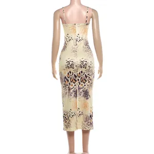 Back view detail of a sexy sleeveless spaghetti strap bodycon midi dress with irregular animal print.