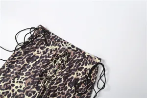 Women's leopard print slim micro flare trousers detail, featuring trendy side drawstrings.