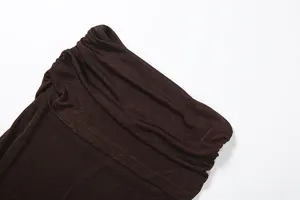 Dark brown knit cowl neck sleeveless top detail view, soft fabric texture showcasing elegance.