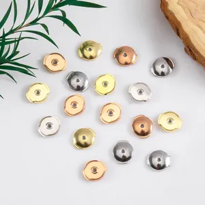 Set of large saucer earring backs with silicone core in gold and silver finishes