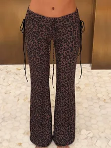 Women's sexy low-waist leopard print flare pants with side lace-up details for summer.
