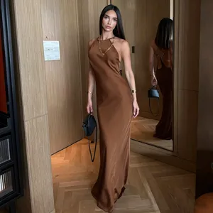 Sleek brown halter neck satin maxi dress for women, elegant sleeveless backless party dress.