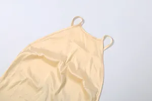 Detailed view of women elegant backless halter neck solid satin dress summer slim fit.