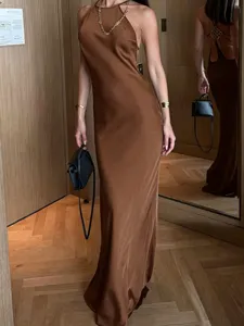 Sleeveless halter neck solid color maxi dress, perfect for summer evening parties and clubwear.
