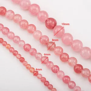 Pink strawberry quartz round beads in 4mm, 6mm, 8mm, and 10mm sizes for DIY jewelry