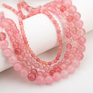 Strands of strawberry pink dyed quartz round beads for DIY jewelry making accessories