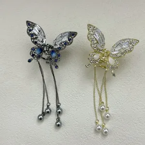 Elegant metal butterfly hair claw clips with long tassels and shimmering crystal beads