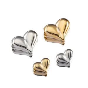 Professional shot of high-shine metallic gold and silver heart beads for DIY jewelry