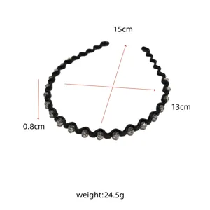 Detail view showing the 15cm x 13cm dimensions and weight of the wavy black crystal headband