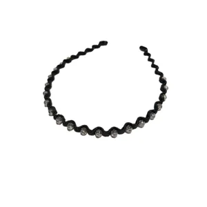 Elegant black wavy crystal headband featuring sparkling beads hair accessory for women