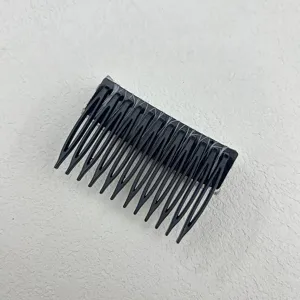 Detailed close-up view of a matte black anti-slip hair insert comb for broken hair styling