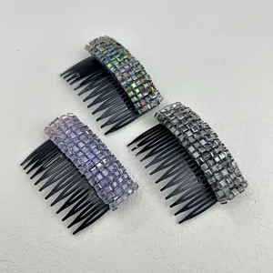 Detailed shot of three elegant crystal-embellished hair combs in purple, grey, and multicolor