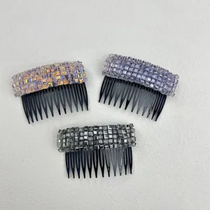 Detail shot of three elegant crystal insert combs in iridescent, purple and grey tones