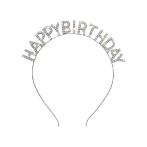 Primo piano di cerchietto argento Happy Birthday con strass scintillanti per feste