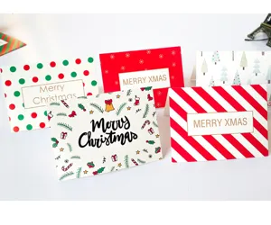 Variety of mini Christmas cards with festive patterns and Merry Xmas greetings