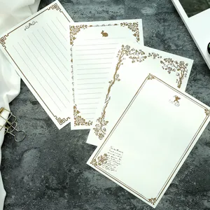 Detailed view of vintage A5 stationery letter paper set with floral and rabbit designs
