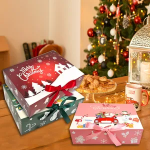 Festive Christmas gift boxes with Merry Christmas print and ribbons in holiday scene
