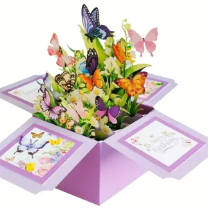 Open purple 3D pop-up butterfly birthday card box with colorful flowers and butterflies.