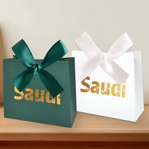 Elegantes cajas de regalo para dulces con tema de palmera saudí y lazos de cinta de seda