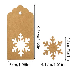 Detailed view of brown kraft paper tag with snowflake cutout showing dimensions in cm and inches