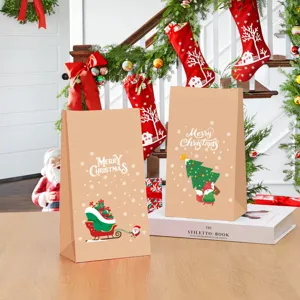 Sacs cadeaux de Noël festifs en papier kraft avec des motifs de joyeuses fêtes