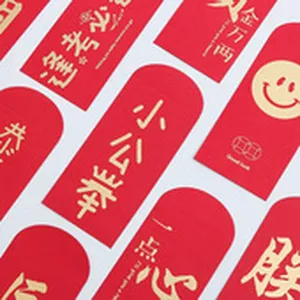 Detail view of red and gold foil blessing stickers for creative gift packaging seals