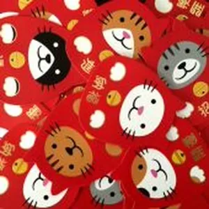 Detailed macro view of cute red lucky cat stickers featuring traditional Chinese blessings