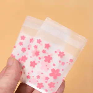 100pcs pink cherry blossom frosted translucent self-adhesive bags for cookie packaging
