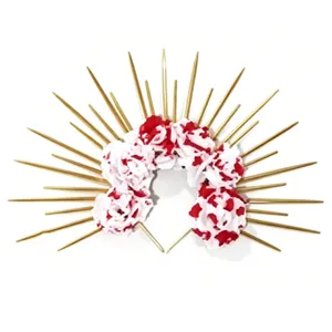 Close-up detail of Halloween sunburst halo headband with golden spikes and bloody roses