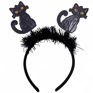 Detailed view of Halloween headband with cartoon black cats and black tinsel trim.
