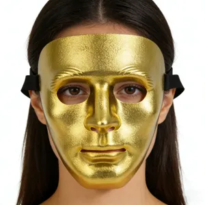 Detailed view of a shiny gold Halloween masquerade mask worn for party performances