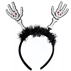 Close-up detail of Halloween headband with black tinsel and white skeleton hands.