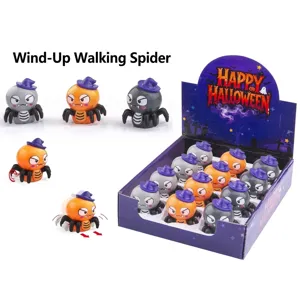 Set mit 12 Halloween-Aufziehspinnen in verschiedenen Farben in einer lila Displaybox