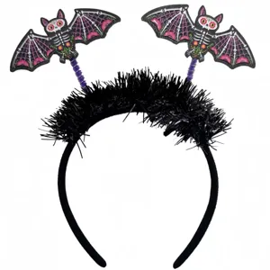 Close-up detail of Halloween bat headband featuring colorful skeleton patterns and black tinsel
