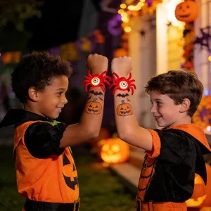 Close-up of two children wearing glowing red spider wristbands during a Halloween night party