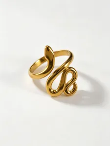 Detailed shot of a stylish gold snake ring, modern geometric winding serpent design jewelry.