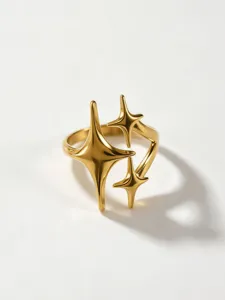Close up of the trendy 18k gold stainless steel geometric multi-star ring detail view.
