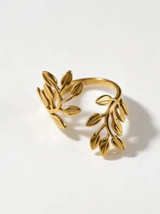 Gold stainless steel open leaf ring detail, geometric hollow design trendy fashion jewelry.