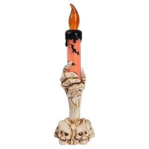 Detaillierte Ansicht der LED-Skeletthand-Kerzenlampe mit Fledermausdrucken für Halloween