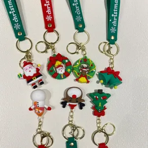 Bunte Weihnachts-Schlüsselanhänger aus PVC mit Weihnachtsmann- und Rentier-Details