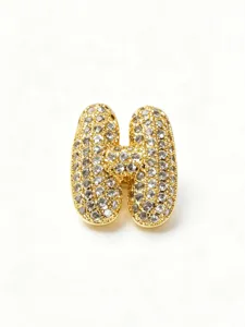 Gold-plated stainless steel puffy letter H pendant sparkling rhinestone pave detail charm.