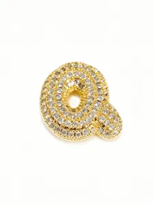 Gold-plated stainless steel iced out bubble letter Q pendant close-up, sparkly rhinestone.