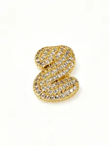 Detailed view of gold plated stainless steel bubble letter pendant with sparkling micro paved stones.